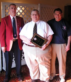 Bubba -Ron England receiving his "Voice of the Central Region Hoop Shoot" award, Central Region Director Jim Dorris, Bubba & Past Central Region Director Jim Fuller